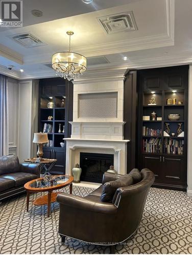 1116 - 9255 Jane Street, Vaughan, ON - Indoor Photo Showing Living Room With Fireplace