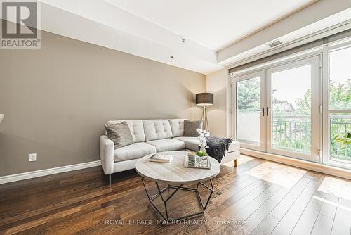 208 - 34 Plains Road E, Burlington, ON - Indoor Photo Showing Living Room