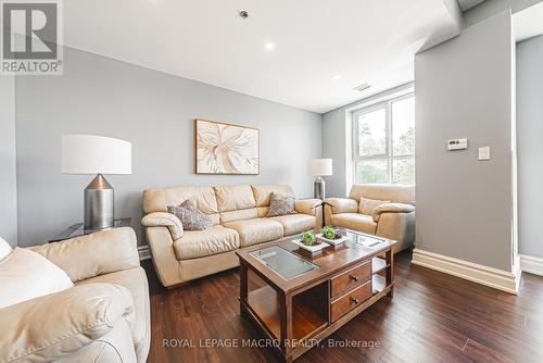 208 - 34 Plains Road E, Burlington, ON - Indoor Photo Showing Living Room