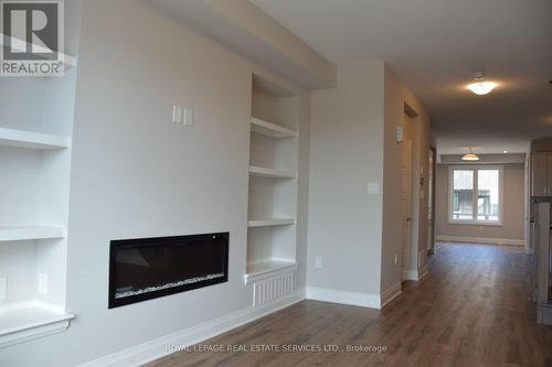 1208 Wheat Boom Drive, Oakville, ON - Indoor With Fireplace