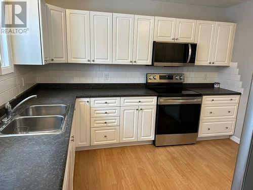 235 Willow Drive, Tumbler Ridge, BC - Indoor Photo Showing Kitchen With Double Sink