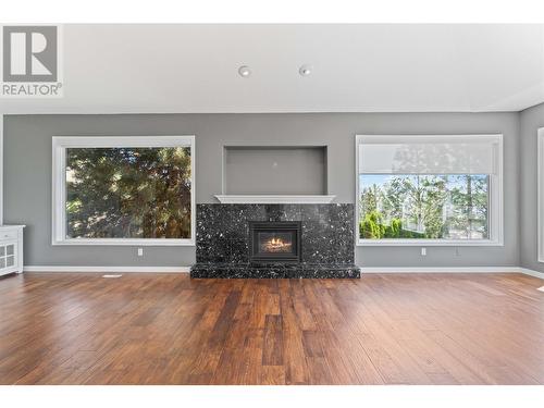 947 Purcell Court, Kelowna, BC - Indoor Photo Showing Living Room With Fireplace