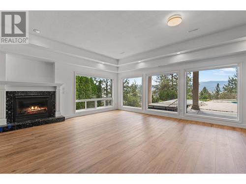 947 Purcell Court, Kelowna, BC - Indoor Photo Showing Living Room With Fireplace