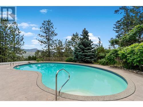 947 Purcell Court, Kelowna, BC - Outdoor With In Ground Pool With Backyard