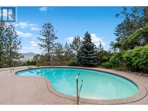 947 Purcell Court, Kelowna, BC - Outdoor With In Ground Pool With Backyard