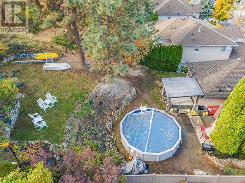 2105 Bowron Street, Kelowna, BC - Outdoor With Above Ground Pool