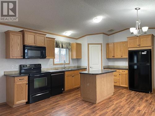 5332 42 Street, Fort Nelson, BC - Indoor Photo Showing Kitchen With Double Sink