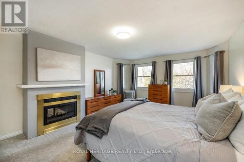 360 Sheppard Avenue, Pickering, ON - Indoor Photo Showing Bedroom With Fireplace