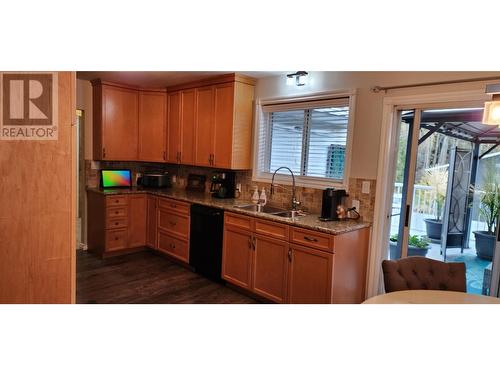 1918 Caughlin Road, Fruitvale, BC - Indoor Photo Showing Kitchen With Double Sink