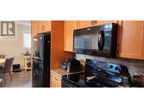 1918 Caughlin Road, Fruitvale, BC - Indoor Photo Showing Kitchen