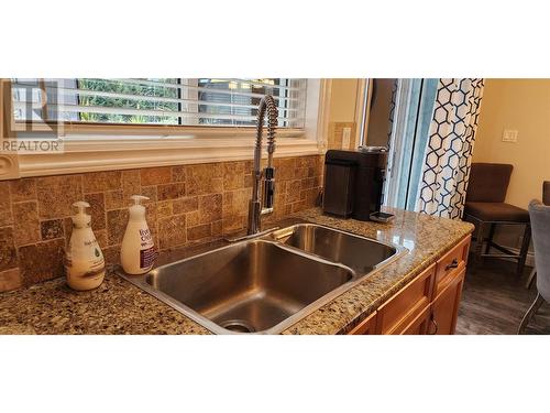 1918 Caughlin Road, Fruitvale, BC - Indoor Photo Showing Kitchen With Double Sink