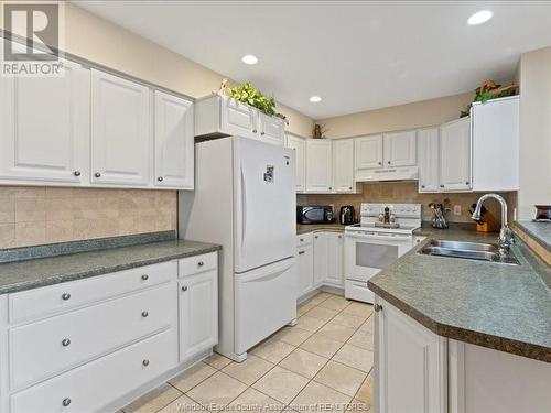 325 Village Grove Unit# 506, Tecumseh, ON - Indoor Photo Showing Kitchen With Double Sink