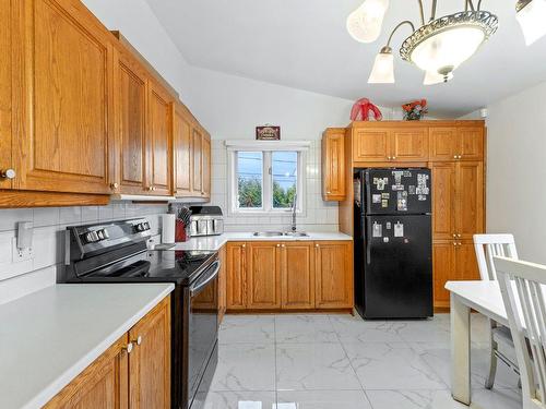 Kitchen - 102 11E Rue, Laval (Laval-Des-Rapides), QC - Indoor Photo Showing Kitchen