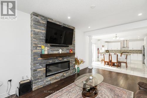 4 Dolomiti Court, Hamilton, ON - Indoor Photo Showing Living Room With Fireplace