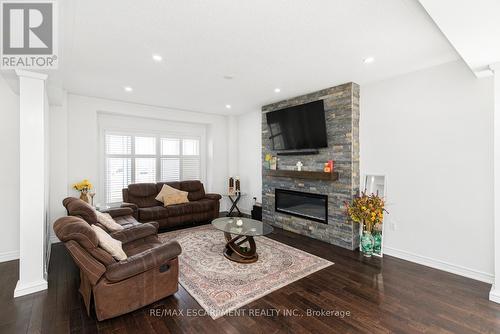 4 Dolomiti Court, Hamilton, ON - Indoor Photo Showing Living Room With Fireplace