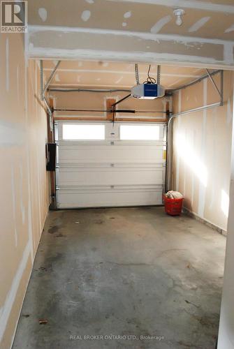 5 - 231 Max Becker Drive, Kitchener, ON - Indoor Photo Showing Garage