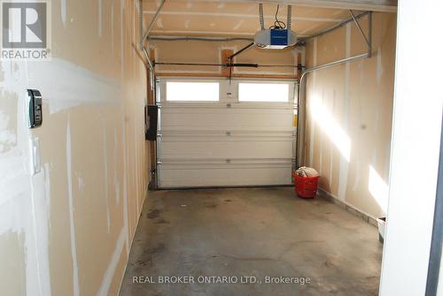 5 - 231 Max Becker Drive, Kitchener, ON - Indoor Photo Showing Garage