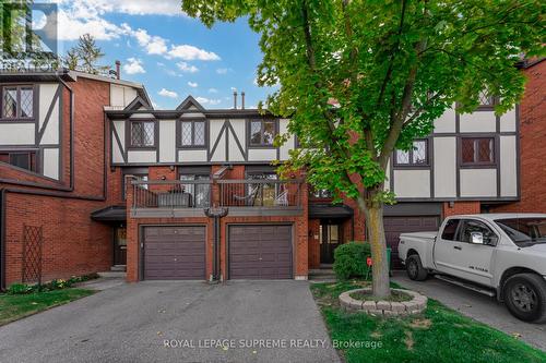 61 - 3360 Council Ring Road, Mississauga, ON - Outdoor With Facade