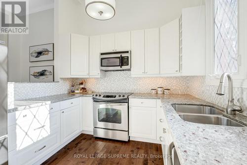 61 - 3360 Council Ring Road, Mississauga, ON - Indoor Photo Showing Kitchen With Double Sink With Upgraded Kitchen