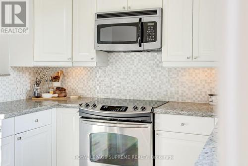 61 - 3360 Council Ring Road, Mississauga, ON - Indoor Photo Showing Kitchen