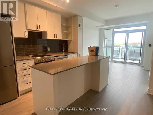 514 - 50 George Butchart Drive, Toronto, ON - Indoor Photo Showing Kitchen