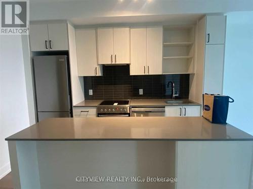 514 - 50 George Butchart Drive, Toronto, ON - Indoor Photo Showing Kitchen