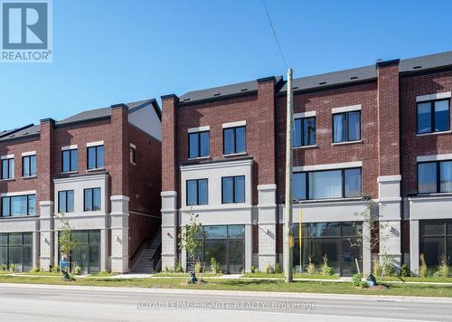 13 - 220 Dissette Street, Bradford West Gwillimbury, ON - Outdoor With Facade