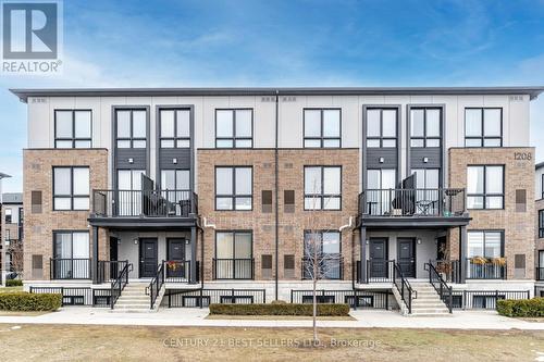 201 - 1208 Main Street E, Milton, ON - Outdoor With Balcony With Facade