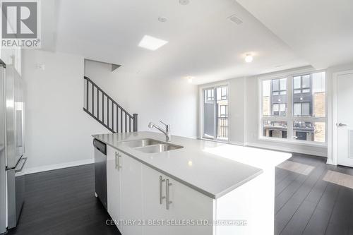 201 - 1208 Main Street E, Milton, ON - Indoor Photo Showing Kitchen With Double Sink