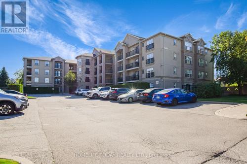 208 - 1487 Maple Avenue, Milton, ON - Outdoor With Facade