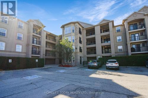 208 - 1487 Maple Avenue, Milton, ON - Outdoor With Facade