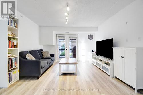 208 - 1487 Maple Avenue, Milton, ON - Indoor Photo Showing Living Room