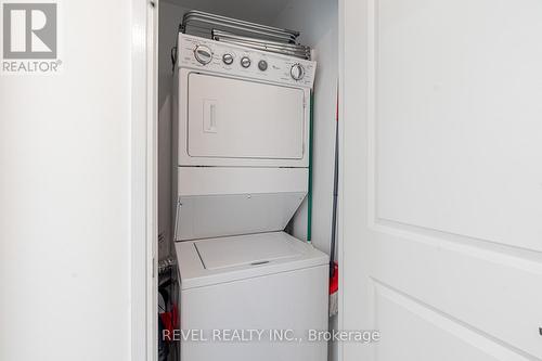 303 - 1 Scott Street, Toronto, ON - Indoor Photo Showing Laundry Room