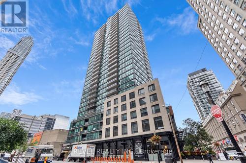 303 - 1 Scott Street, Toronto, ON - Outdoor With Facade