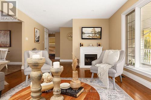 80 Stephenson Road 7 E, Huntsville, ON - Indoor Photo Showing Living Room With Fireplace