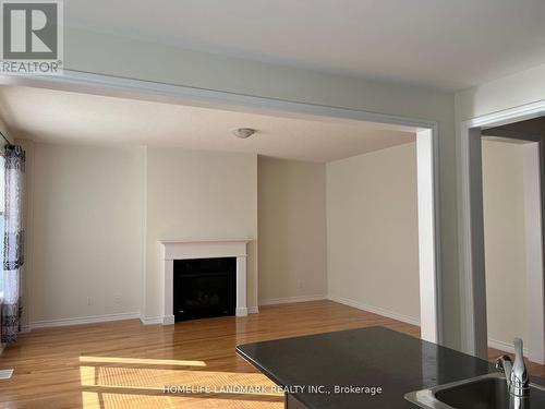 69 Chessington Avenue, East Gwillimbury, ON - Indoor Photo Showing Living Room With Fireplace