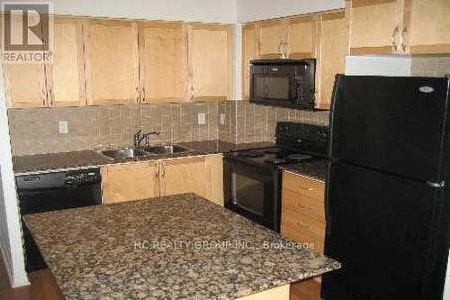 510 - 310 Burnhamthorpe Road W, Mississauga, ON - Indoor Photo Showing Kitchen With Double Sink