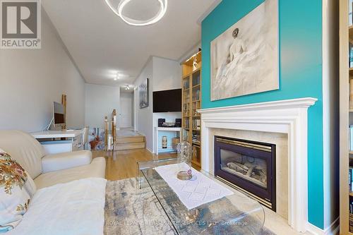 6962 Elliott Parliament Street, Mississauga, ON - Indoor Photo Showing Living Room With Fireplace