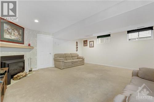 95 Springcreek Crescent, Ottawa, ON - Indoor Photo Showing Basement With Fireplace