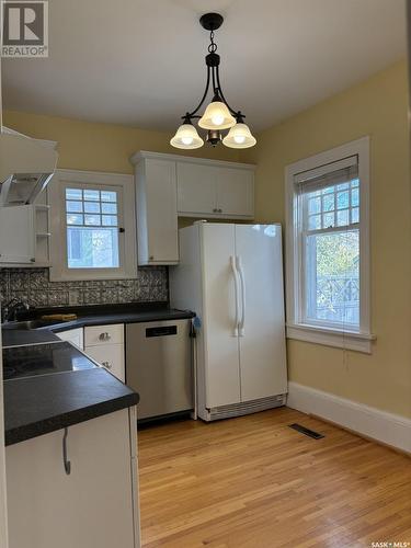 76 Angus Crescent, Regina, SK - Indoor Photo Showing Kitchen With Double Sink