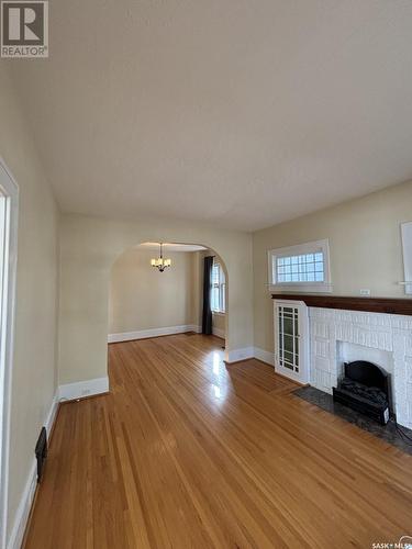 76 Angus Crescent, Regina, SK - Indoor Photo Showing Other Room With Fireplace