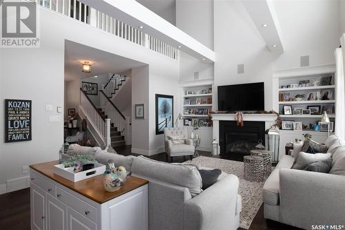 160 Hanley Crescent, Edenwold Rm No. 158, SK - Indoor Photo Showing Living Room With Fireplace