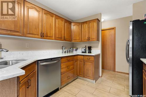 1202 Wascana Highlands, Regina, SK - Indoor Photo Showing Kitchen With Double Sink