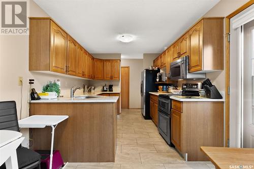 1202 Wascana Highlands, Regina, SK - Indoor Photo Showing Kitchen