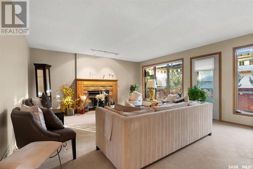 1202 Wascana Highlands, Regina, SK - Indoor Photo Showing Living Room With Fireplace