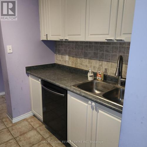 307 - 65 Silvercreek Parkway N, Guelph, ON - Indoor Photo Showing Kitchen With Double Sink