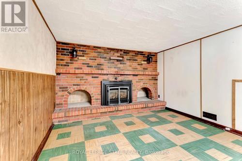 33 Greenwood Street, Hamilton, ON - Indoor Photo Showing Other Room With Fireplace