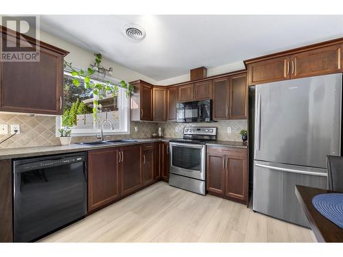 3832 Glen Canyon Drive, West Kelowna, BC - Indoor Photo Showing Kitchen With Double Sink