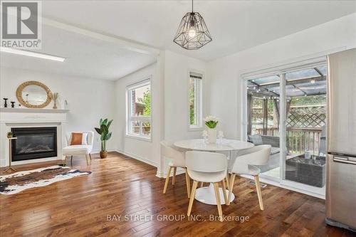 62 Summerset Drive, Barrie, ON - Indoor Photo Showing Dining Room With Fireplace