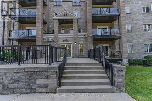 210 - 44 Ferndale Drive S, Barrie, ON - Outdoor With Balcony With Facade